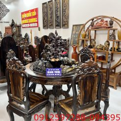 bàn ăn tròn gỗ mun hoa Lào ghế hồng hạc